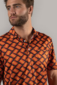 Load image into Gallery viewer, Black with Orange Waves Polo Shirt

