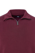 Maroon pullover with a quarter zip on a white background