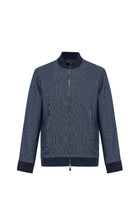 Blue textured bomber jacket on a white background